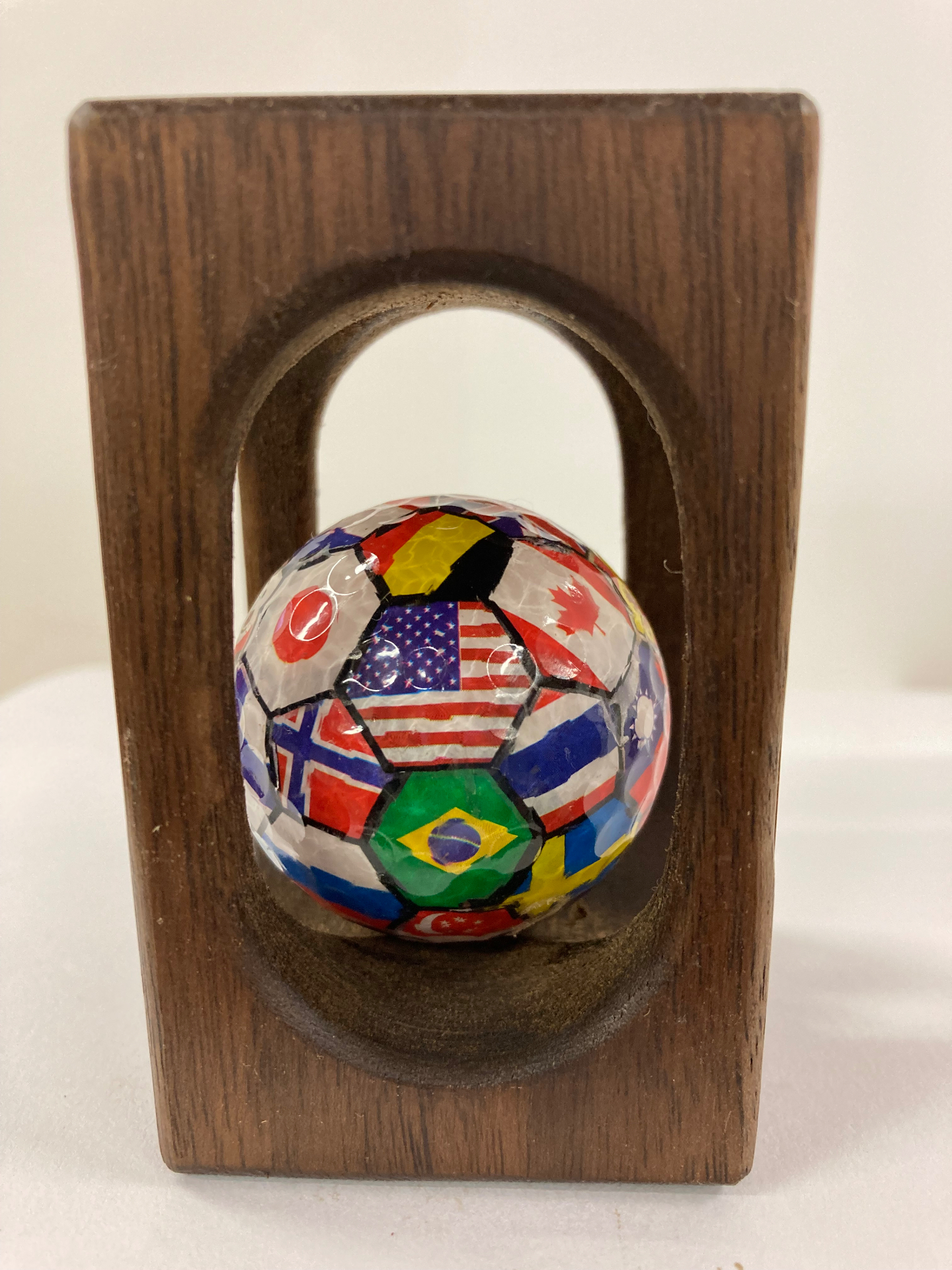 Nations — handmade golf ball fidget in hardwood crate